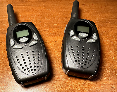 walkie talkie on wood table