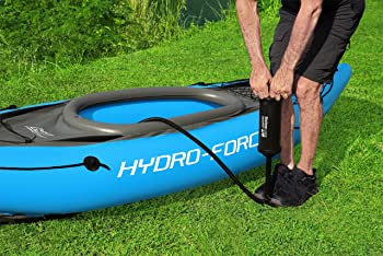 Air pump of the kayak in a grass background